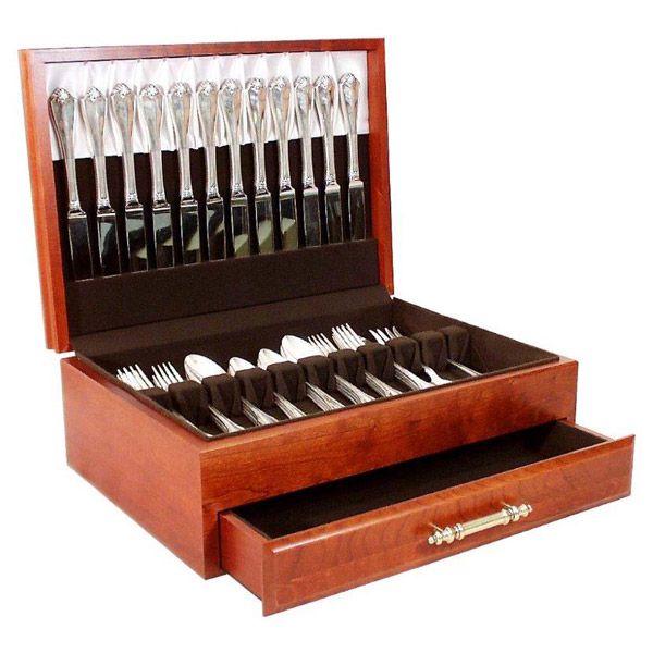 The American Chest Company's Bounty Flatware Chest, open with flatware in it.