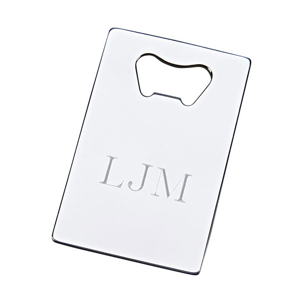Simple flat bottle opener in silver featuring custom initial engraving.