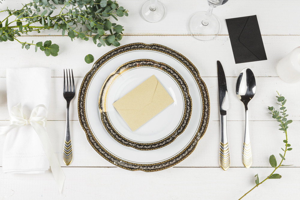 Elegantly set table with china and silver