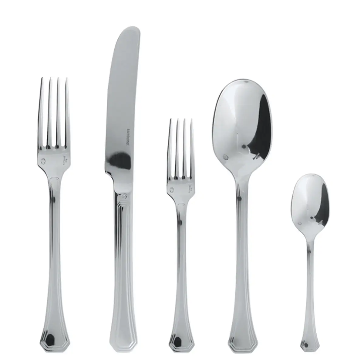 Reflective stainless flatware spread out on white back